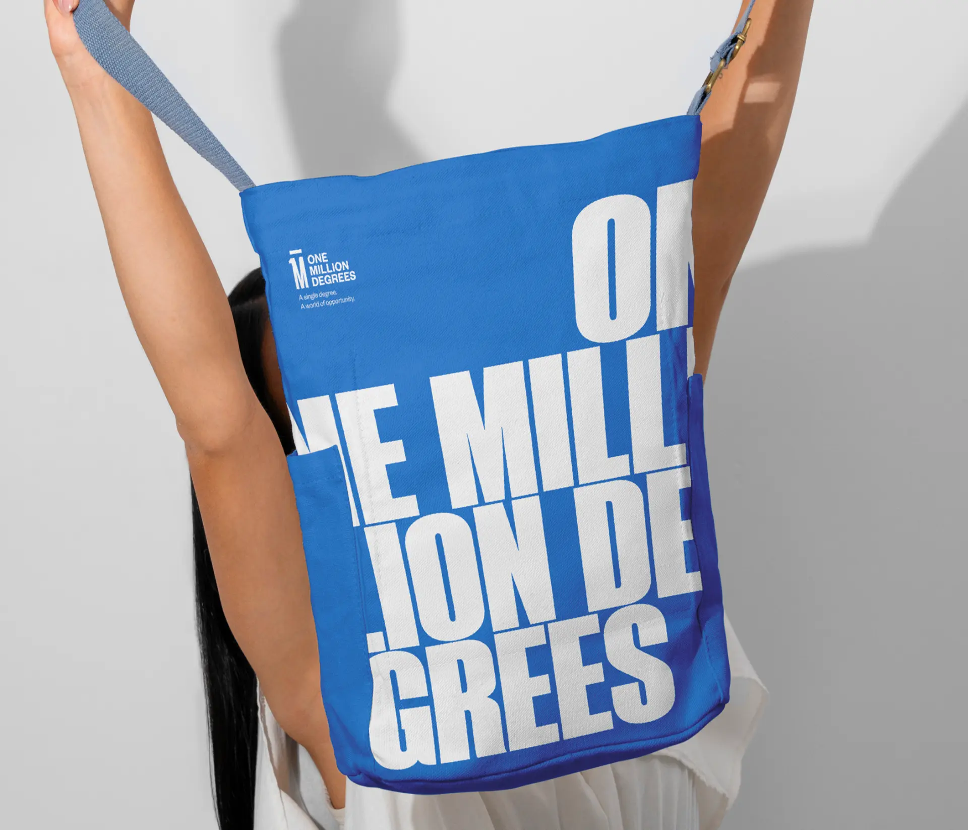 One Million Degrees branded tote bag with bold wordmark.