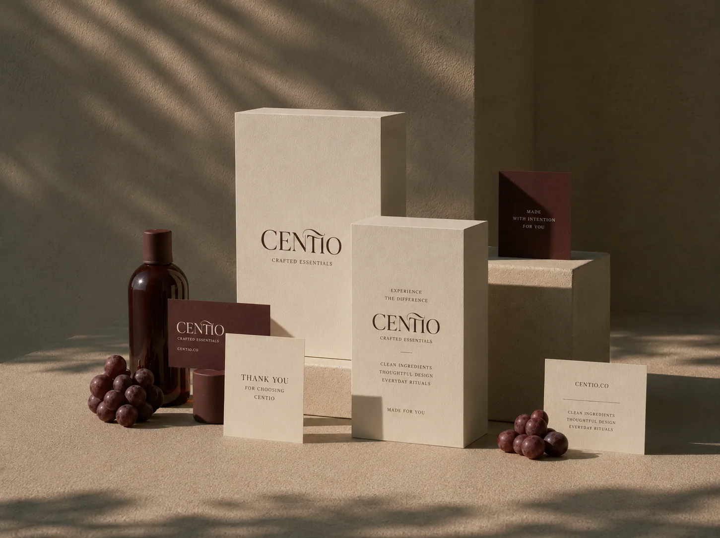 Centio brand packaging suite — boxes, cards, and bottle with a custom logotype