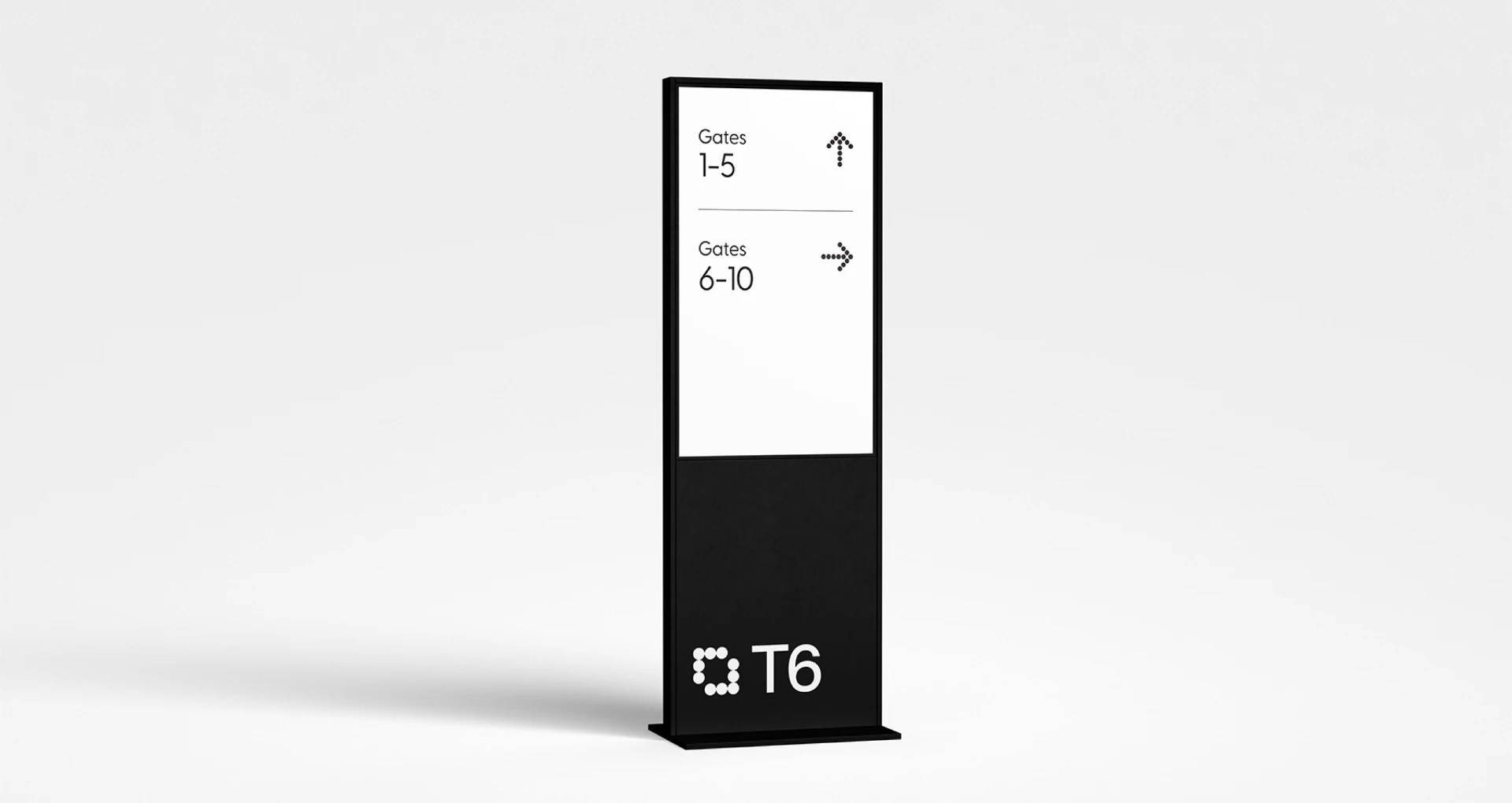 JFK Terminal 6 wayfinding kiosk with dot-matrix directional arrows for gates.