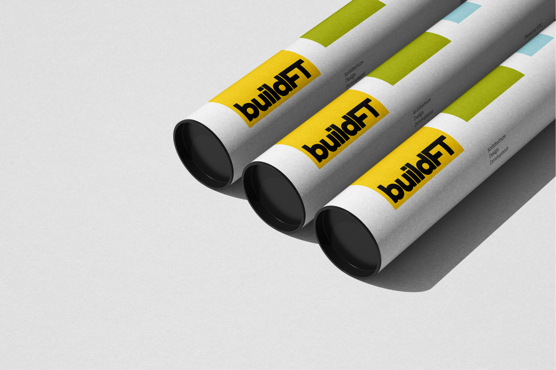 BuildFT blueprint tubes with brand system applied.