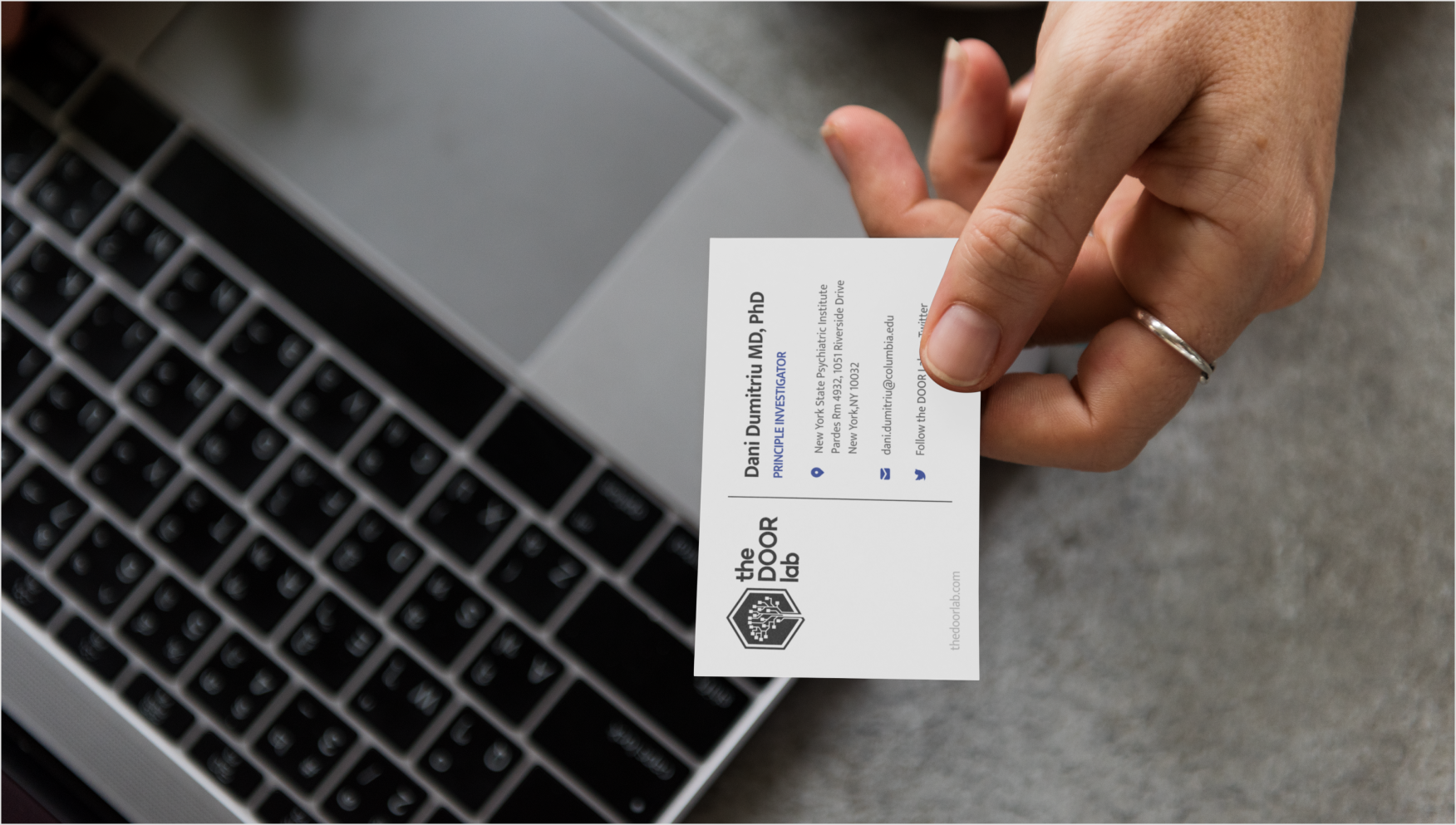 The DOOR Lab business card for Dr. Dani Dumitriu, principal investigator.